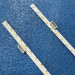 bande led blanc jaune points lumineux espacés moderne connecteurs électriques opacité
