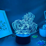 Lampe à lave bleu allumée en mode nuit