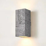 lampe murale moderne noir gris rose beige clair aspect naturel éclairage quotidien cuisine étude