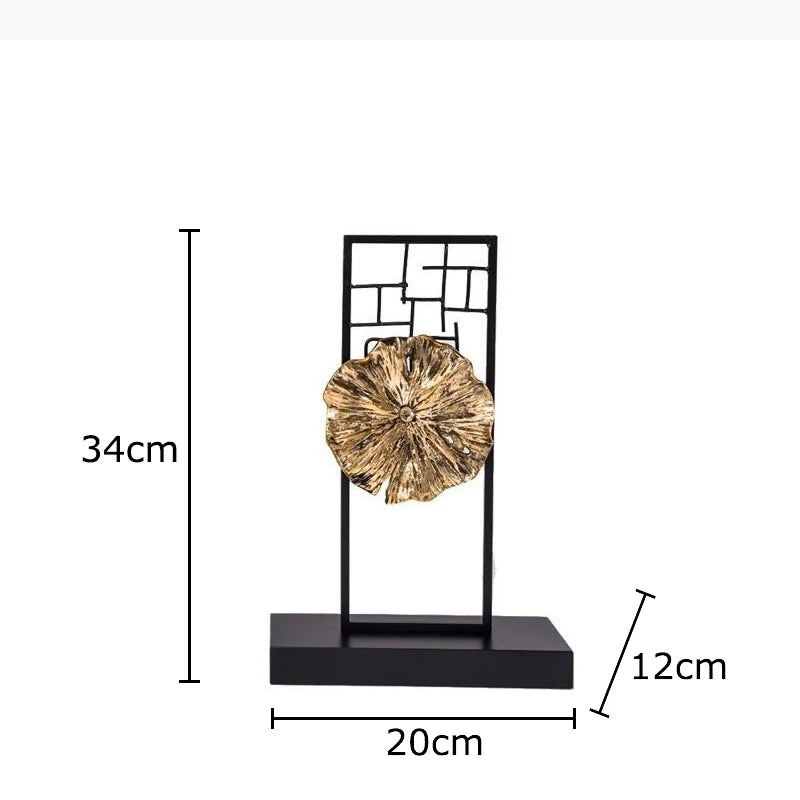 sculpture décorative moderne noir doré feuille stylisée brillante contemporaine minimaliste base carrée structure métallique