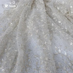 tissu dentelle feuilles brodé élégant polyester translucide blanc argent materiaux couture robes mariage
