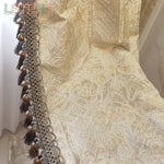 rideau occultant beige clair broderie florale luxe classique pompons dorés tassel