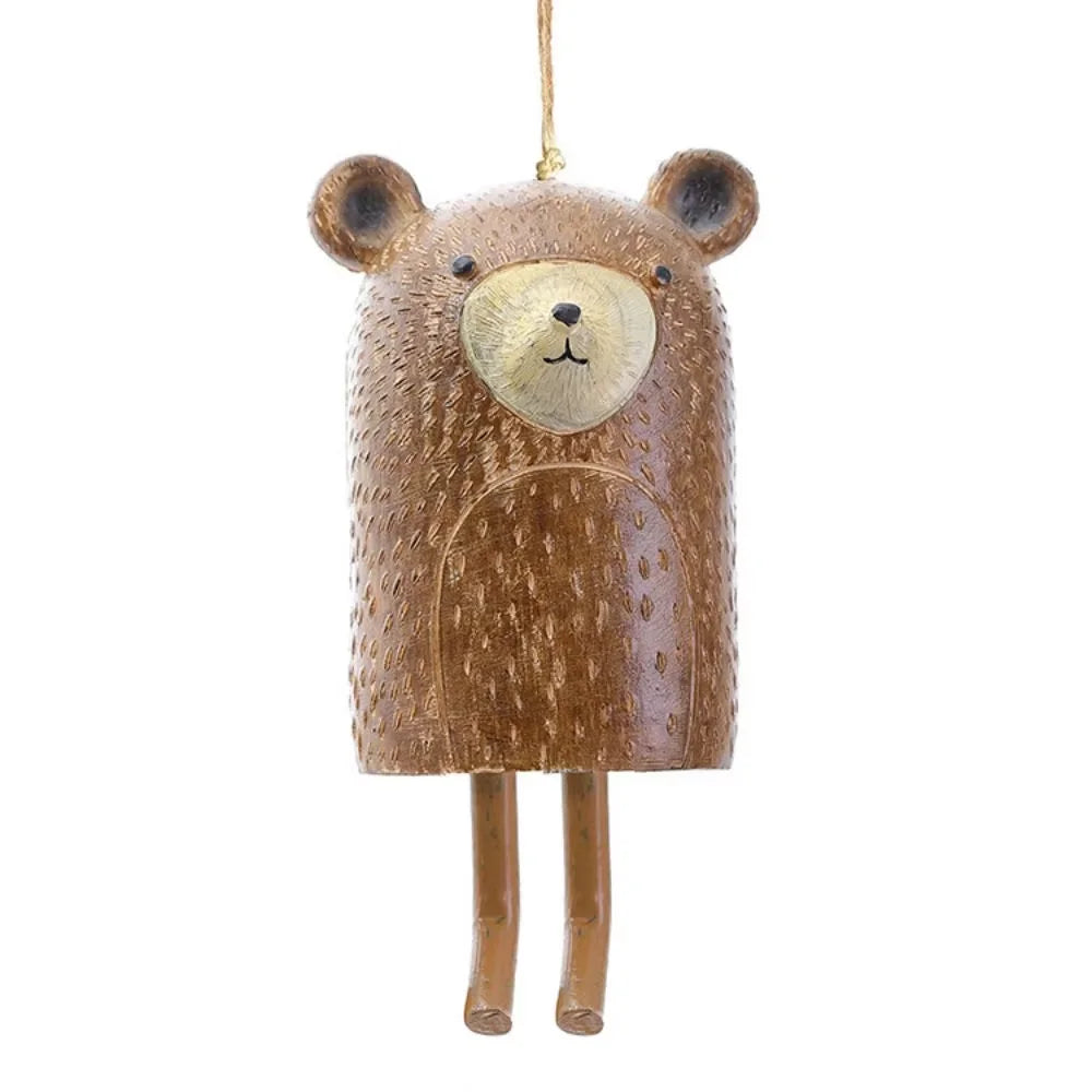cloches décoratives animaux ours renard hibou motifs poils plumes artisanal extérieur