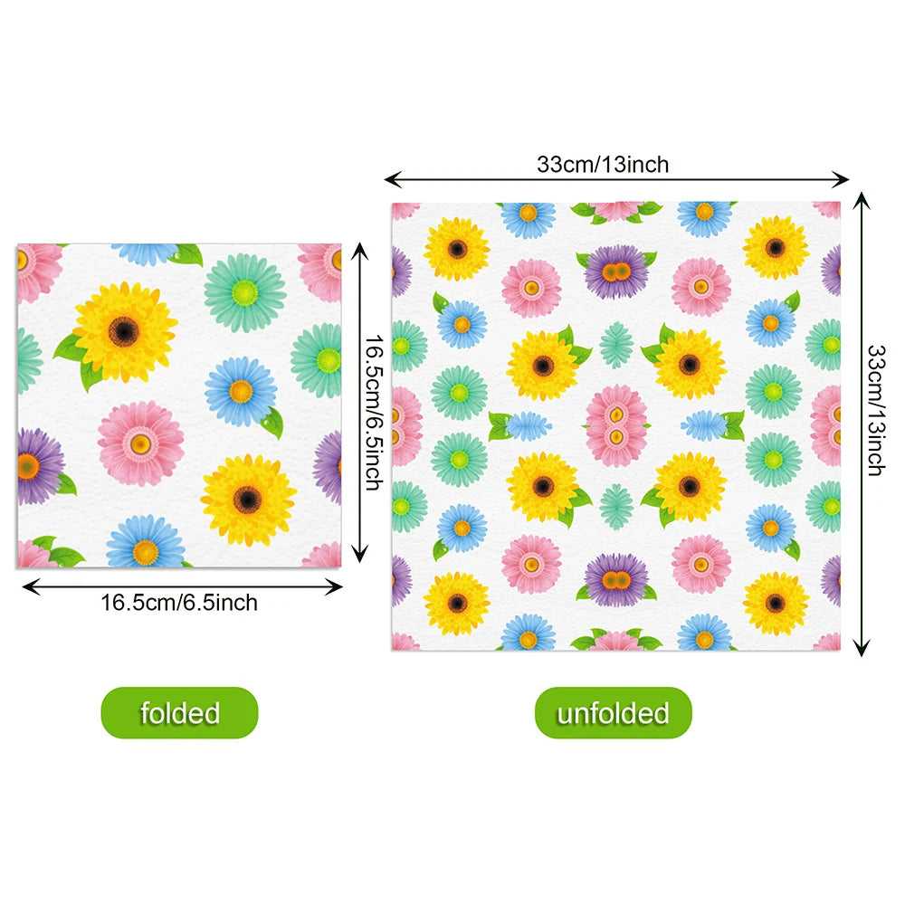 serviettes papier festives fleur blanche carreaux motif géométrique rose clair pliées dépliées jetables anniversaire