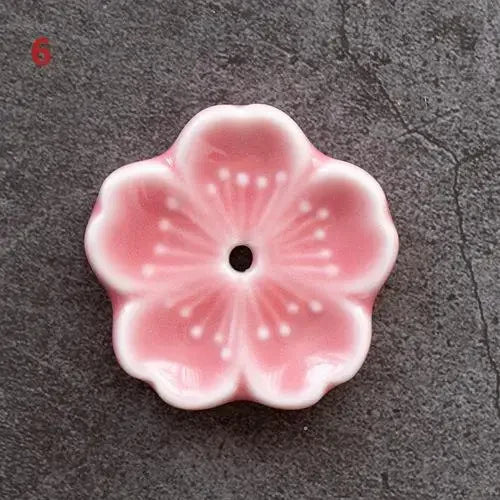 support bâtonnets encens fleurs stylisées artisanal rose bleu vert jaune blanc