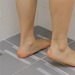 bandelettes adhésives antidérapantes blanc noir texture micro poreuse moderne adhésif respectueux environnement sécurité baignoire