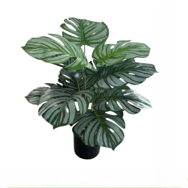 feuilles artificielles monstera vert nervures blanches décoration intérieure moderne trois pièces