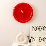 horloge murale moderne aiguilles originales minimaliste couleur jaune rouge bleu blanc