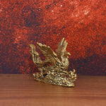 statue dorée phénix relief sculpté oiseau mythique artisanal intérieur salon decoration