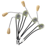 perceuse main transparente moderne vert clair noir beige câble bouton bois