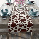 nappe rectangulaire marron peau vache motif damier decoration intérieure rustique fleurs fruits assiettes serviettes