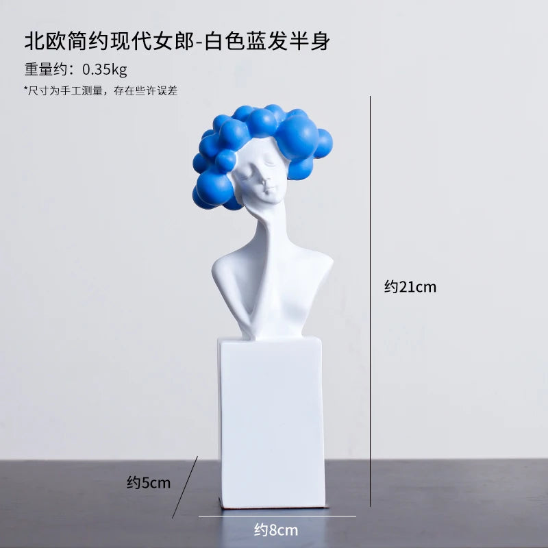 statuette décorative buste féminin noir blanc bleu or moderne minimaliste.surface lisse polie.formes arrondies socle