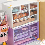 boîtes rangement tiroirs transparentes violet rose blanc organisation pratique moderne