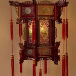 lanterne traditionnelle chinoise bois sculpté rouge décorative pompon fête mariage jardin