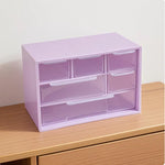 boîtes rangement tiroirs transparentes violet rose blanc organisation pratique moderne