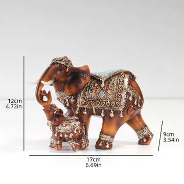 statue éléphant marron clair doré motifs ornements artisanat décoration intérieure chambre salon