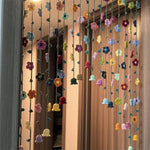 rideau porte multicolore fleurs crochetées décoration bohème intérieur semi transparent artisanal festif
