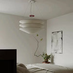 suspension lumineuse moderne blanc texture naturelle opacité minimaliste câbles lumière neutre chambre salon