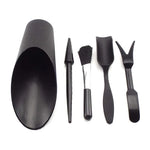 ensemble jardinage outils pelle houe brosse sac semis arrosoir pot fleurs vert noir moderne