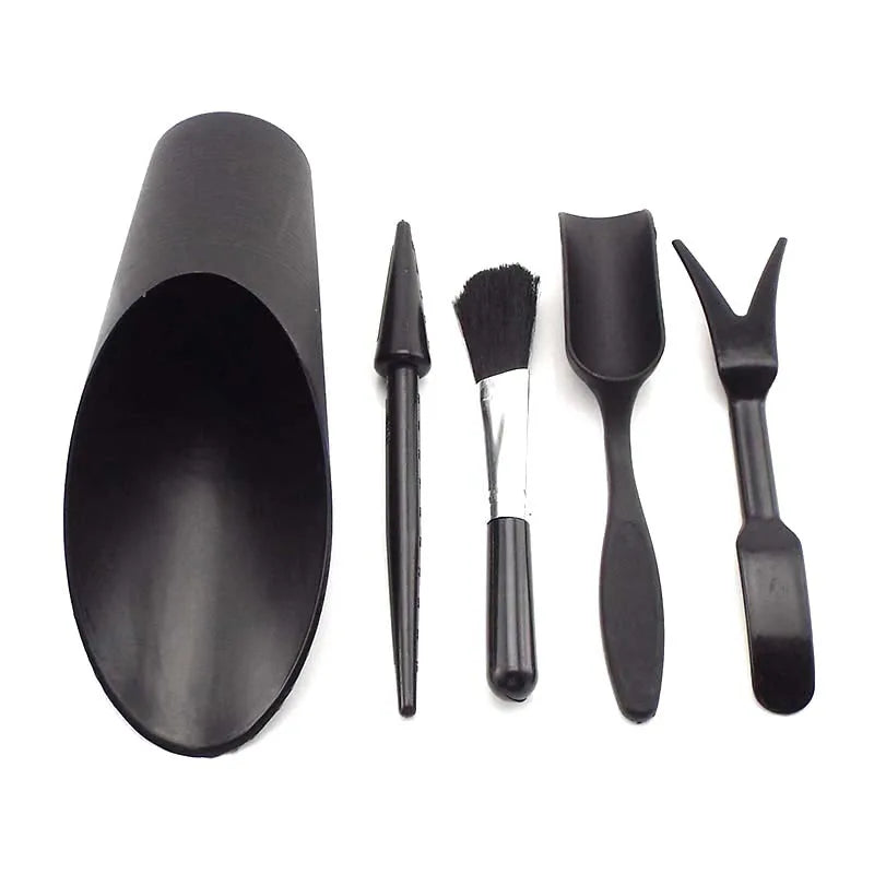 ensemble jardinage outils pelle houe brosse sac semis arrosoir pot fleurs vert noir moderne