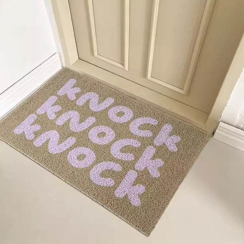 tapis d'entrée moderne lettres knock imprimées beige clair rose pâle antidérapant extérieur porche couloir