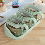 boîtes épices transparentes verre moderne rose verte bleu poignées couteau service herbes condiments cuisine