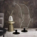lampe sol silhouette visage humain blanc noir contemporain minimaliste interrupteur bouton aluminium