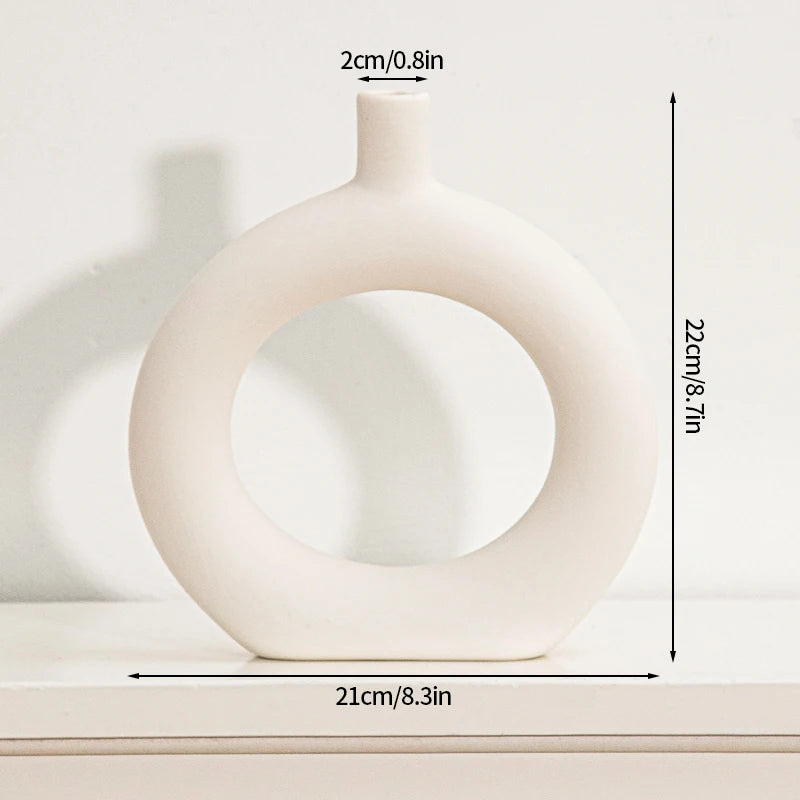 vases blancs modernes céramique rondes lignes horizontales décoration intérieure simple