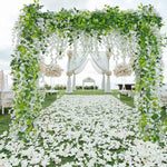 guirlande végétale naturelle fleurs vertes violettes blanches roses extérieur décoration maison jardin mariage festivités
