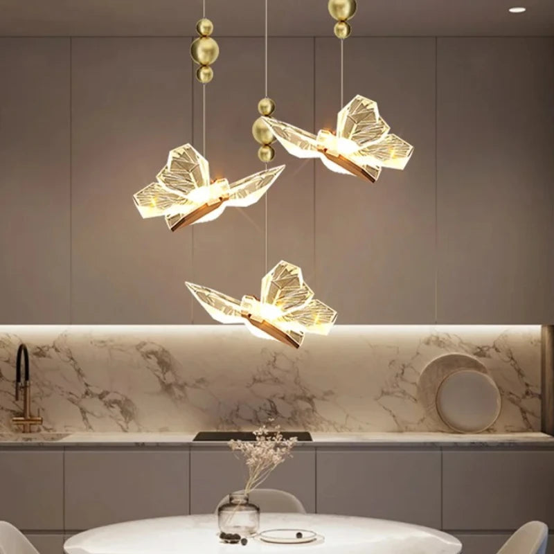 suspension lumineuse papillon transparent dorée origami moderne éclairage intérieur chambre salon