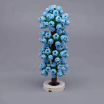 arbres miniatures créatifs fleurs roue dentée couleurs vives base plate naturelle