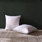 coussins décoratifs carrés blancs texture lisse moderne 40x40cm coton polyester