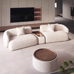canapé salon moderne tissu beige vert olive chesterfield coussins table basse