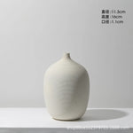 vases céramique blancs rayures horizontales modernes fleurs artificielles