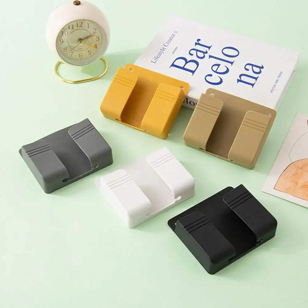 support mural chargeur smartphone blanc moderne minimaliste adhésif prise câble rangement télécommande