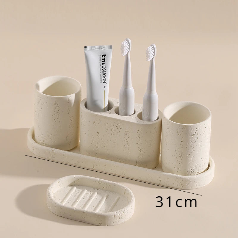 ensemble salle bain moderne brosse dents pot dentifrice distributeur savon blanc crème grain ciment