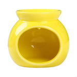 diffuseur parfum bougie chauffe parfum moderne minimaliste bleu clair rose jaune vert blanc rouge