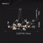 suspension luminaire branches cuivre fleurs artificielles moderne noir blanc salon salle manger intérieur