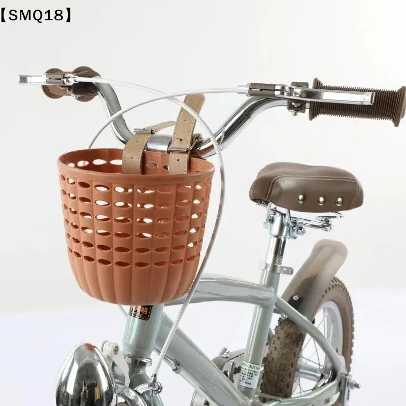 panier vélo rose clair noir perforé cercles moderne pratique cuir boucle