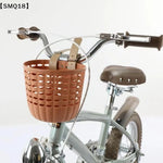 panier vélo rose clair noir perforé cercles moderne pratique cuir boucle