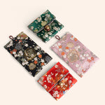 porte bijoux réutilisable tissu polyester fleurs motif floral bouton doré violet noir rouge vert