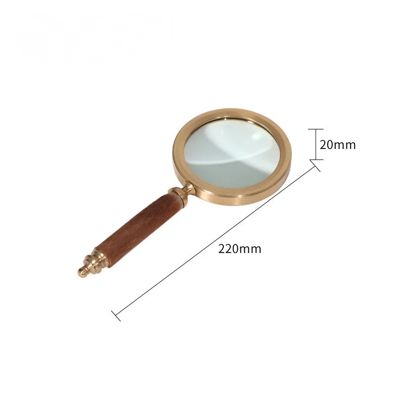 décoration vintage loupe or marron poignée cuir serpent transparente élégante maison