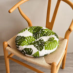 coussin chaise rond moderne couleurs bleu marine blanc vert beige noir motifs géométriques feuilles