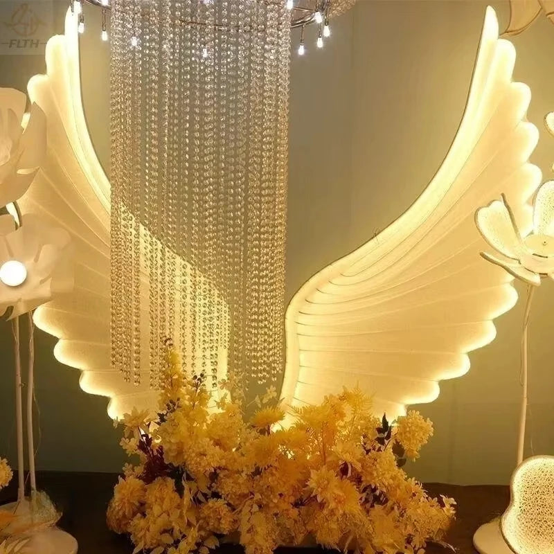 décoration mariage ailes lumineuses blanc nervures modernes pieds métal