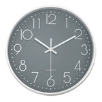 horloge murale cadre doré aiguilles noires numéros blancs moderne chambre coucher