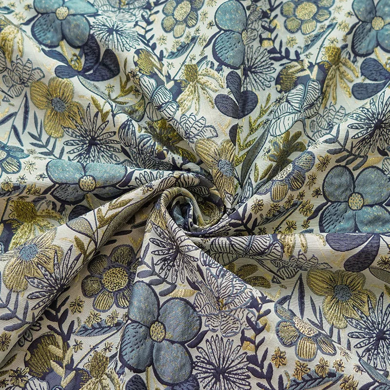 tissu imprimé fleurs stylisées blanc bleu vert moderne élégant polyester large 160cm résistant intempéries