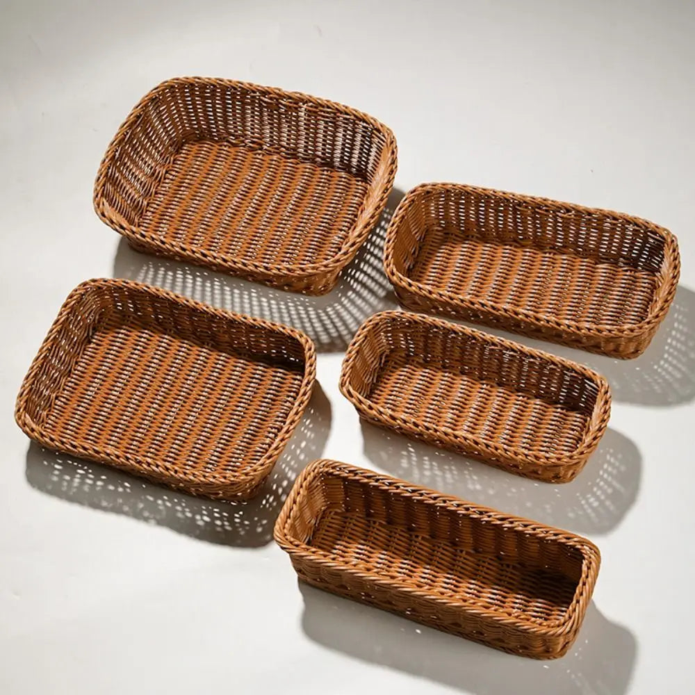paniers osier marron clair tressage traditionnel poignées cuir noir rangement cuisine respectueux environnement