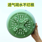 cache pot suspendu moderne vert pastel gris foncé blanc pot plastique chaînes métalliques minimaliste