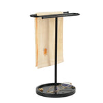 porte serviettes moderne noir mat serviette beige motif orange base circulaire salle bain acier
