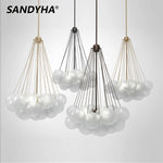 Suspension lumineuse moderne boules sphériques opaques chaînes métalliques blanc salon chambre
